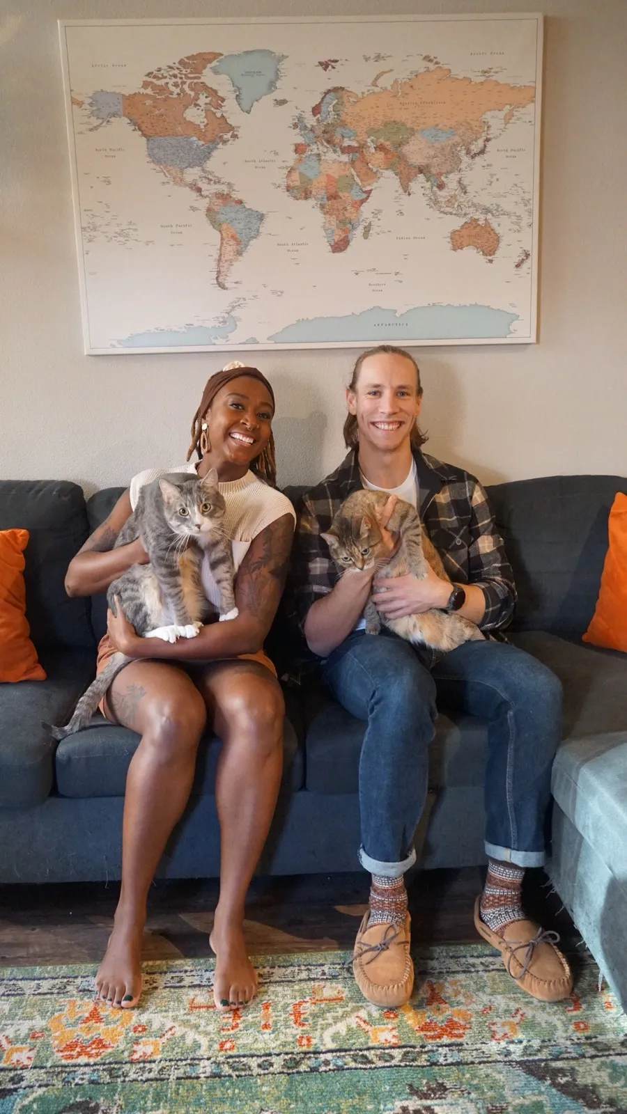 Lucas and his wife Micayla with their two cats